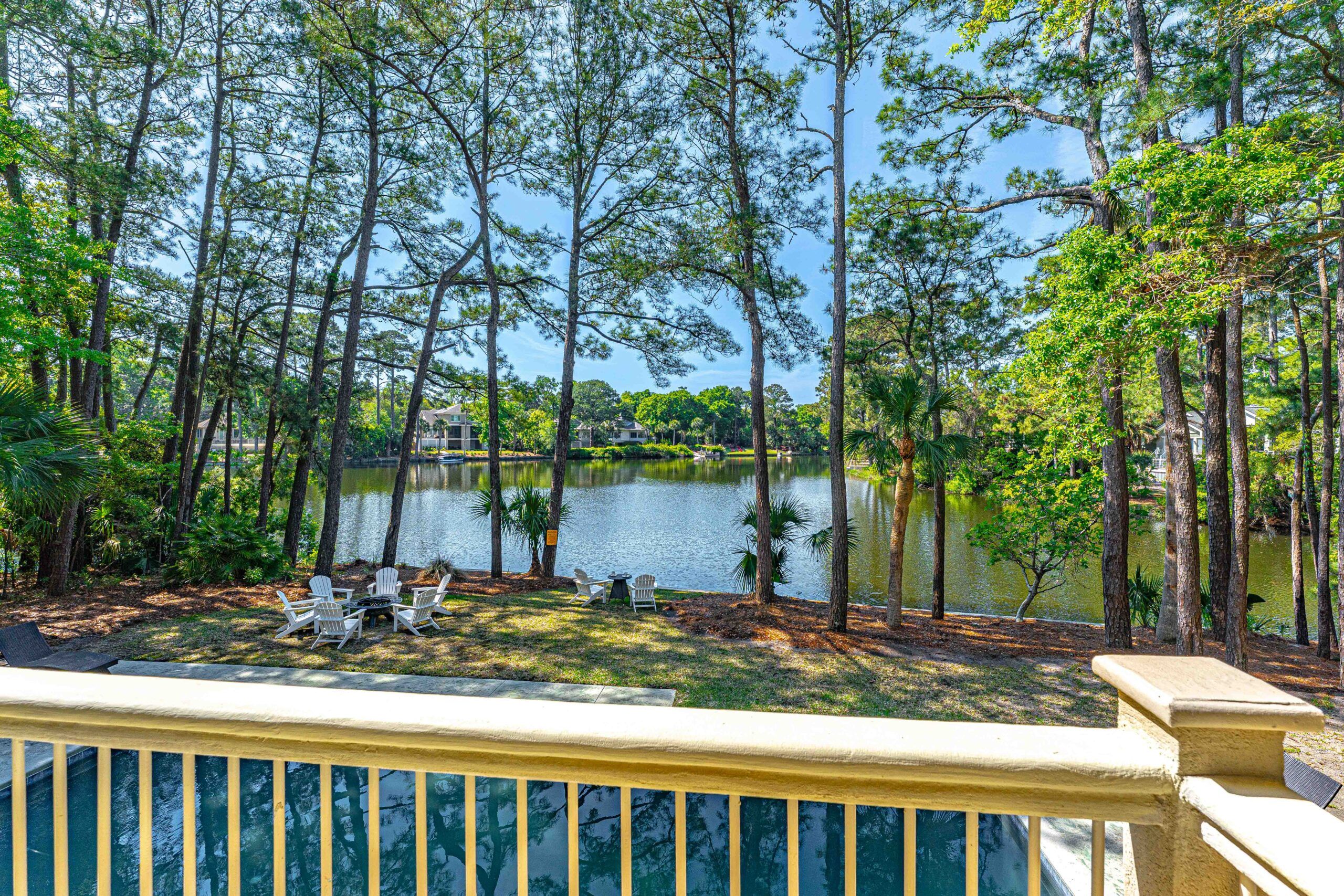 Balcony view down over the lagoon and grounds of the Palmetto Dunes estate