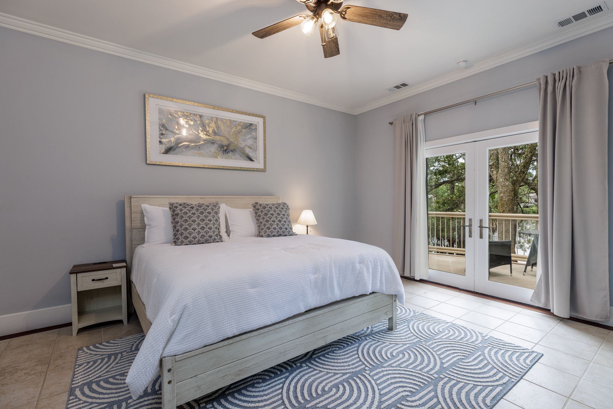 King bedroom suite with natural light in the Palmetto Dunes estate