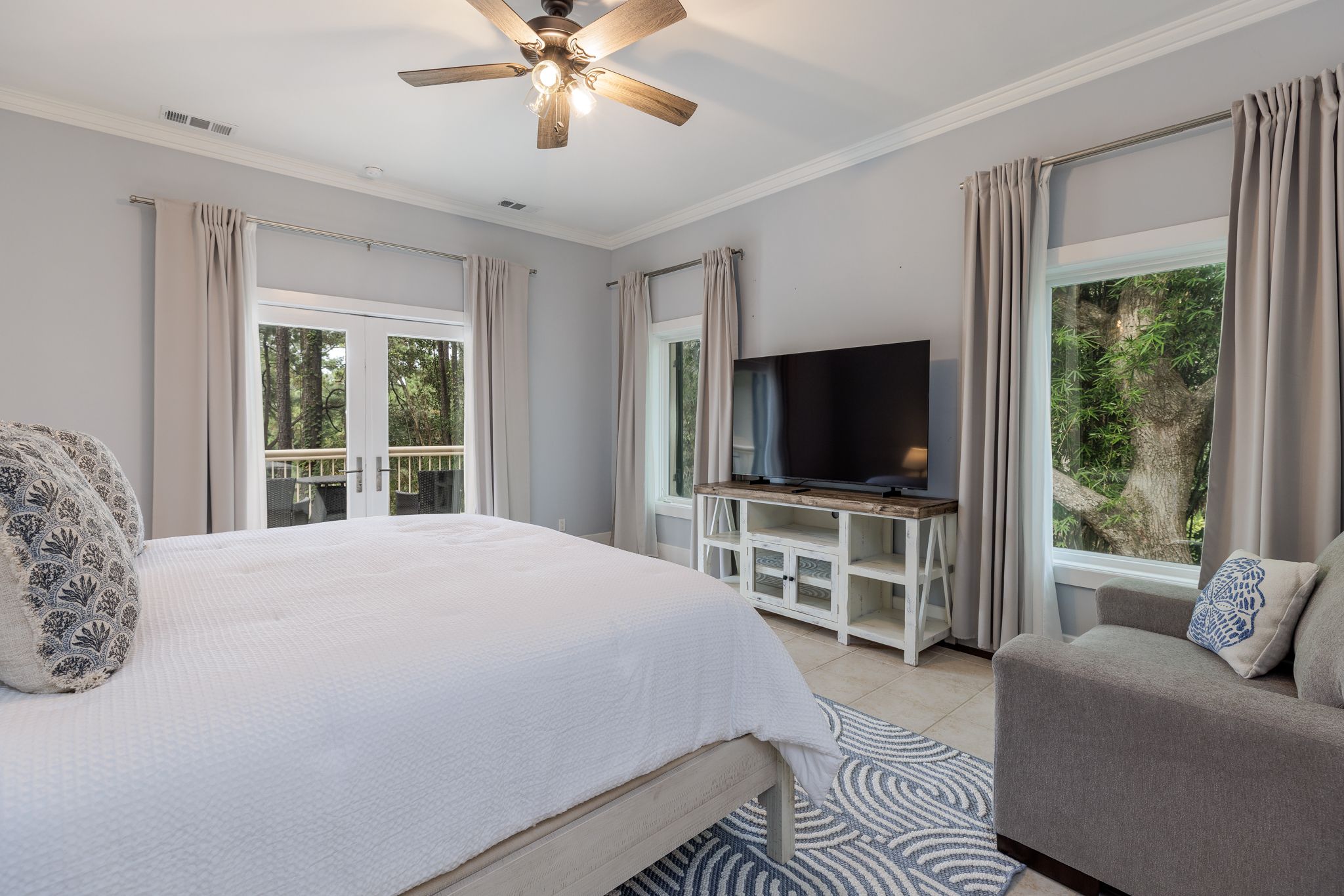 King suite with a made bed and en-suite access