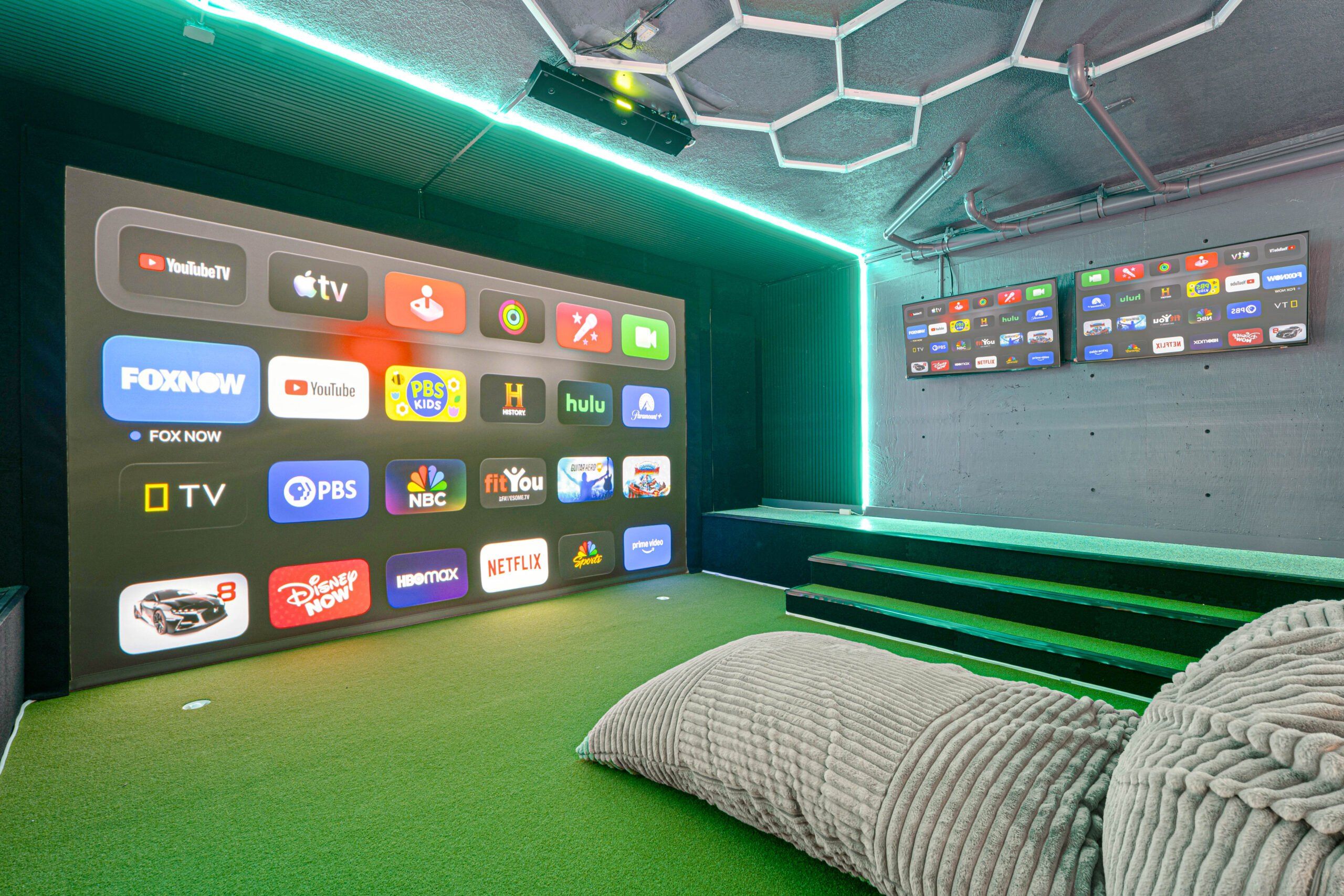 Home theater with a wide projection screen for evening film nights and presentations